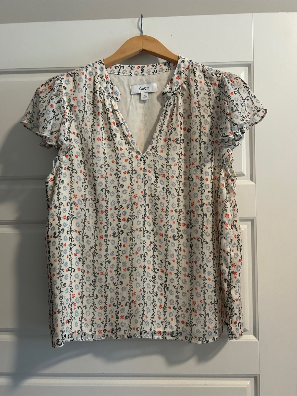 CeCe Cream Floral V-Neck Flutter Sleeve Blouse with Navy and Coral Accents